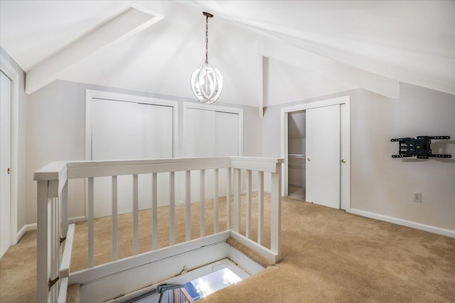 373 Whitford St, Manchester, NH 03104 - hall with carpet floors, an upstairs landing, a chandelier, and baseboards