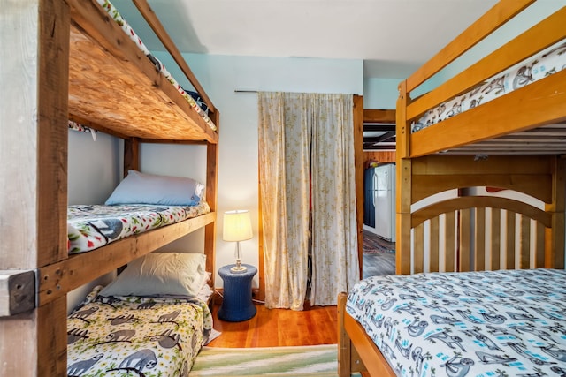 3-5 Cross St, Windham, NH 03087 - bedroom with wood finished floors and freestanding refrigerator