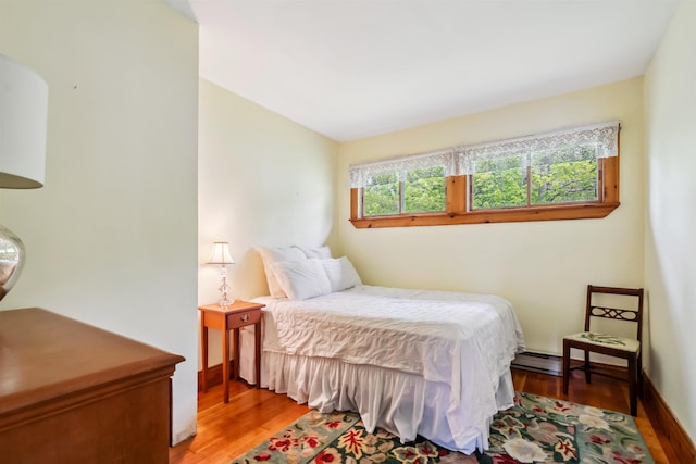 3-5 Cross St, Windham, NH 03087 - bedroom featuring baseboard heating and light wood-style flooring