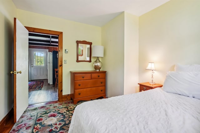 3-5 Cross St, Windham, NH 03087 - bedroom featuring wood finished floors, freestanding refrigerator, and baseboards
