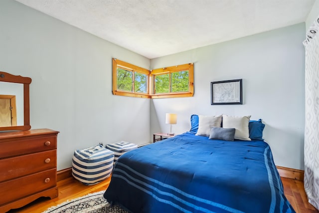 3-5 Cross St, Windham, NH 03087 - bedroom with wood finished floors and baseboards