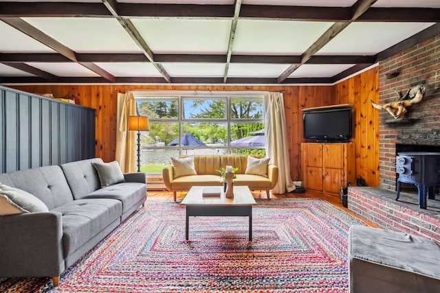 3-5 Cross St, Windham, NH 03087 - living room featuring coffered ceiling, a wood stove, wood walls, beamed ceiling, and wood finished floors