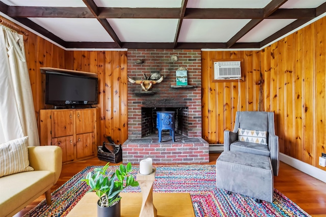3-5 Cross St, Windham, NH 03087 - living room with coffered ceiling, wood walls, wood finished floors, a wood stove, and beam ceiling