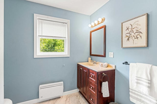 19 Fowlers Ct, Seabrook, NH 03874 - bathroom featuring vanity, toilet, baseboards, and marble finish flooring
