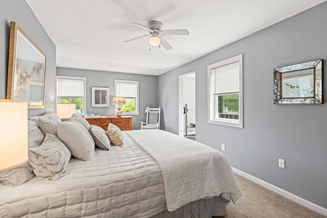 19 Fowlers Ct, Seabrook, NH 03874 - carpeted bedroom with baseboards and a ceiling fan