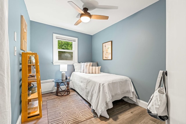 19 Fowlers Ct, Seabrook, NH 03874 - bedroom with wood finished floors, ceiling fan, and baseboards