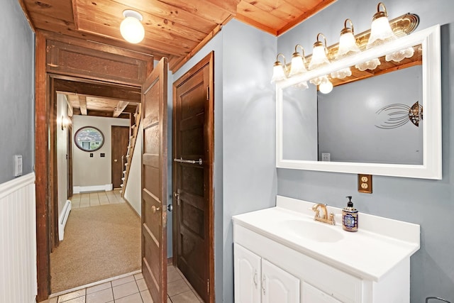 23 Cedarview Ln, Hampton, NH 03842 - bathroom with tile patterned flooring, vanity, and wooden ceiling