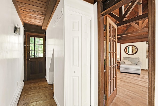 23 Cedarview Ln, Hampton, NH 03842 - hall with wooden ceiling, baseboard heating, and wood finished floors