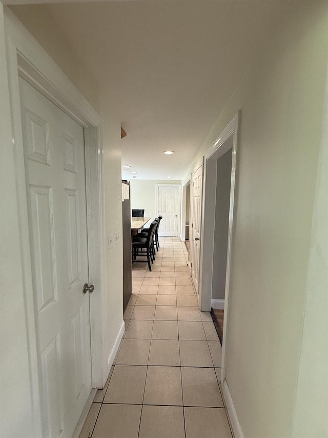 2 Germantown Rd, Derry, NH 03038 - hall featuring light tile patterned flooring, baseboards, and recessed lighting