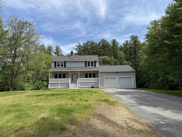 2 Germantown Rd, Derry, NH 03038 - view of front facade featuring a porch, a garage, driveway, a chimney, and a front yard