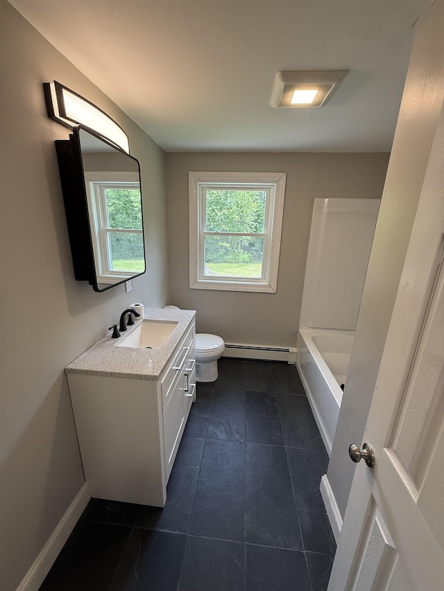 2 Germantown Rd, Derry, NH 03038 - full bathroom featuring a baseboard radiator, healthy amount of natural light, vanity, and toilet