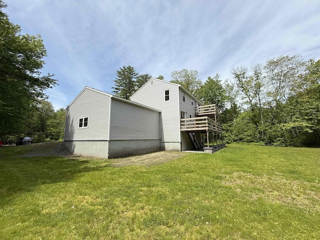 2 Germantown Rd, Derry, NH 03038 - view of side of property featuring a wooden deck and a yard