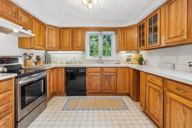 24 Theresa Ave, Salem, NH 03079 - kitchen with stainless steel range with electric stovetop, black dishwasher, under cabinet range hood, and brown cabinets