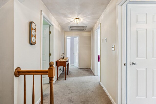 24 Theresa Ave, Salem, NH 03079 - corridor with light carpet and baseboards
