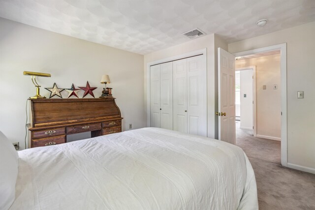 24 Theresa Ave, Salem, NH 03079 - carpeted bedroom with baseboards and a closet