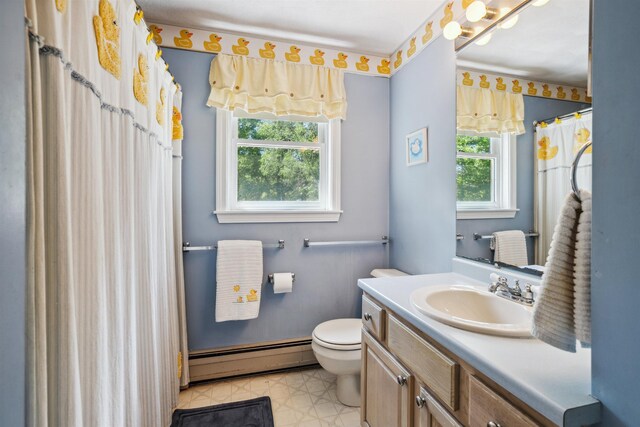 24 Theresa Ave, Salem, NH 03079 - full bath with a baseboard radiator, vanity, toilet, and curtained shower