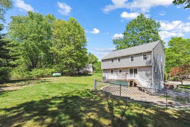 24 Theresa Ave, Salem, NH 03079 - rear view of property with stairway, a deck, and a chimney