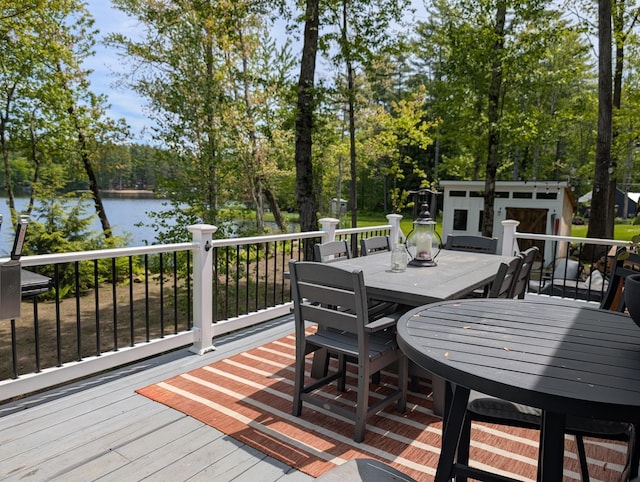 175 Rolfe Pond Dr, Hopkinton, NH 03229 - deck featuring outdoor dining area, a water view, and view of scattered trees