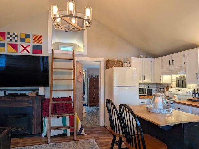 175 Rolfe Pond Dr, Hopkinton, NH 03229 - kitchen featuring butcher block countertops, lofted ceiling, white appliances, white cabinets, and a chandelier