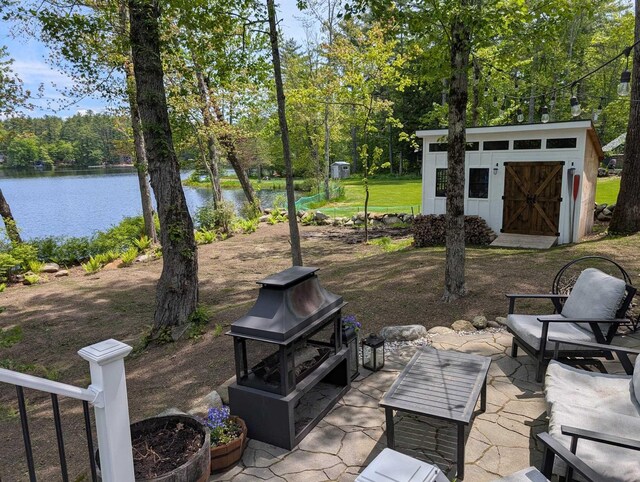 175 Rolfe Pond Dr, Hopkinton, NH 03229 - view of patio with a water view and a wooded view