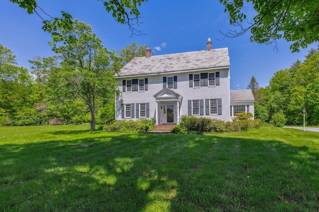 236 Main St, Jaffrey, NH 03452 - colonial-style house with a front yard and a chimney
