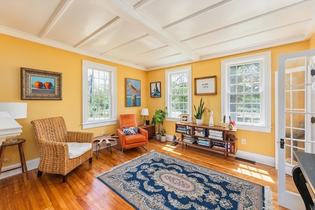 236 Main St, Jaffrey, NH 03452 - living area featuring hardwood / wood-style floors, baseboards, and beam ceiling