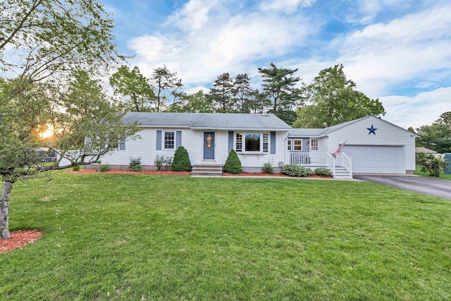 6 Cherry St, Concord, NH 03301 - single story home with driveway, an attached garage, and a front yard