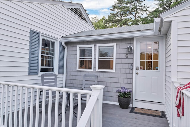 6 Cherry St, Concord, NH 03301 - entrance to property with a deck and roof with shingles