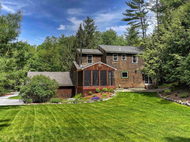 56 Averill Rd, Brookline, NH 03033 - back of house featuring a lawn and a sunroom