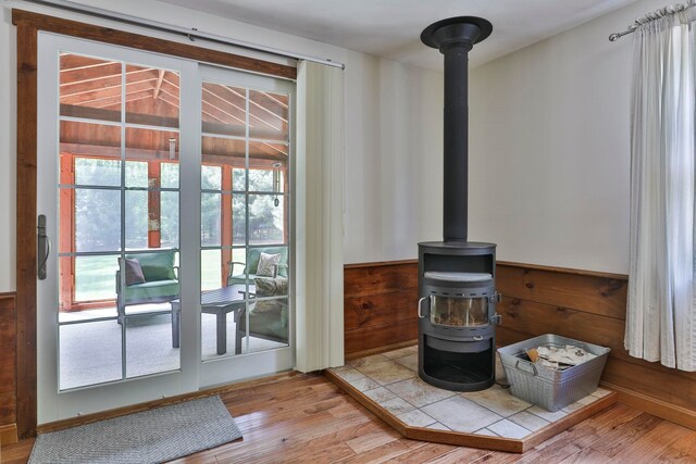 56 Averill Rd, Brookline, NH 03033 - detailed view of a wood stove and wood finished floors