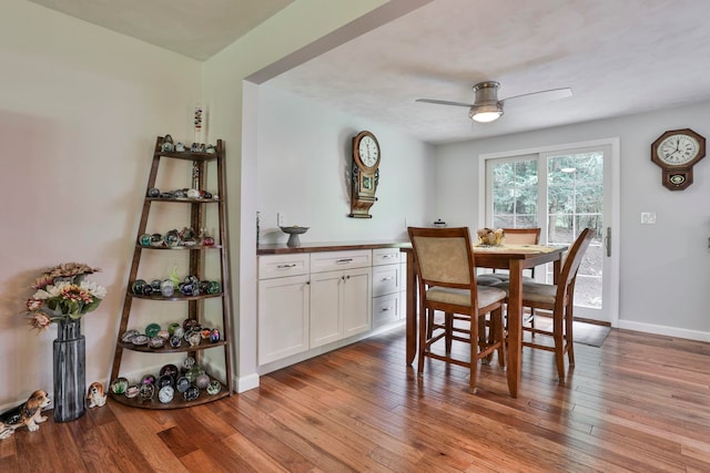 56 Averill Rd, Brookline, NH 03033 - dining area with a ceiling fan, wood finished floors, and baseboards
