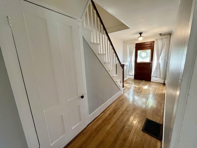 34 S Spring St, Concord, NH 03301 - entryway featuring hardwood / wood-style floors, stairs, and baseboards