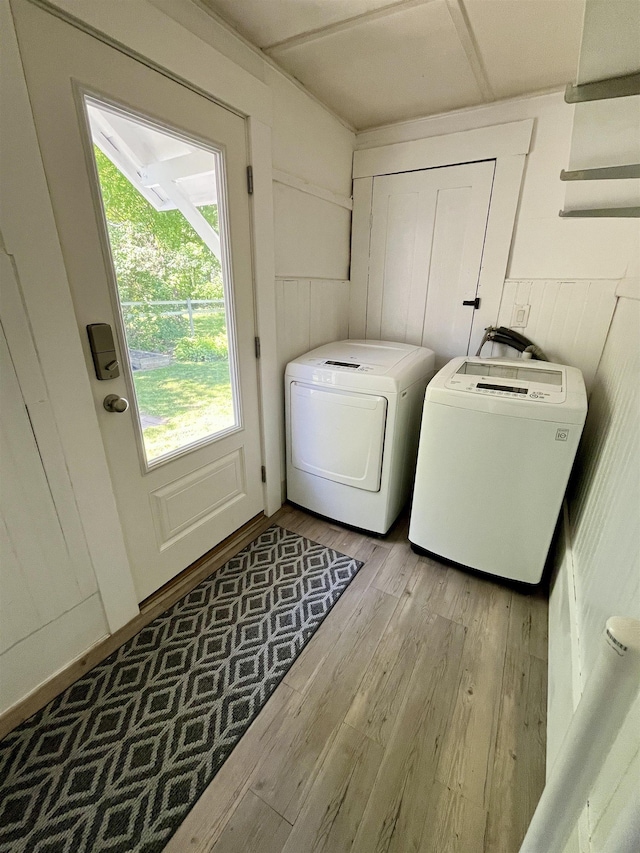 34 S Spring St, Concord, NH 03301 - laundry room featuring separate washer and dryer, wood finished floors, and wooden walls