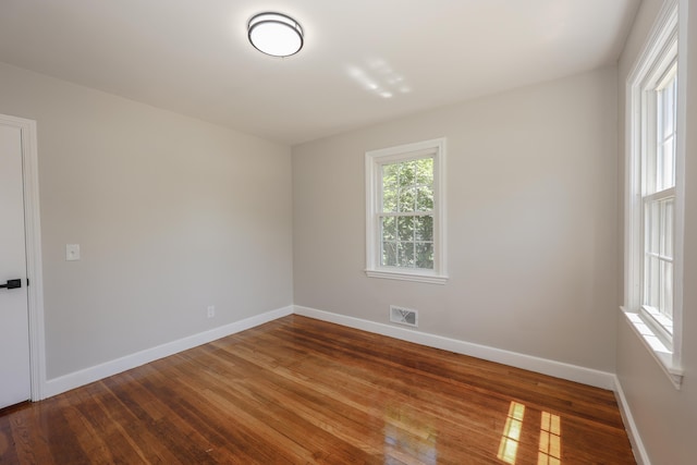 798 Hanover St, Manchester, NH 03104 - spare room with hardwood / wood-style flooring and baseboards
