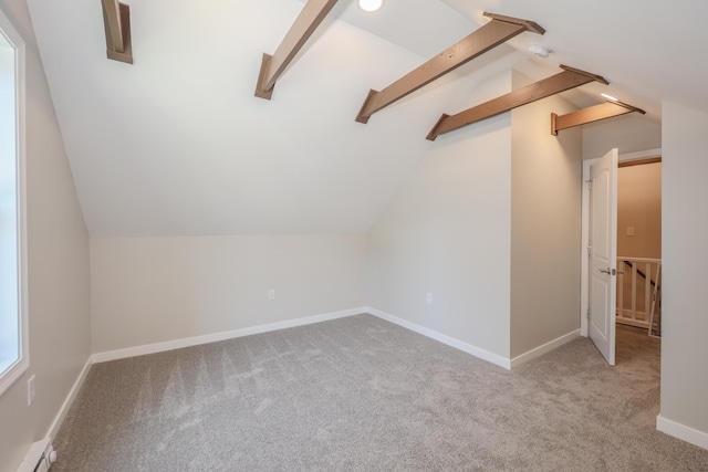 798 Hanover St, Manchester, NH 03104 - bonus room with a baseboard heating unit, vaulted ceiling, carpet, and baseboards