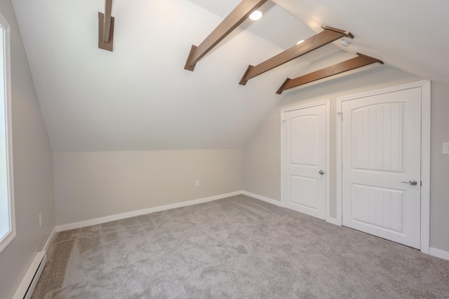 798 Hanover St, Manchester, NH 03104 - bonus room featuring baseboard heating, carpet floors, lofted ceiling, and baseboards