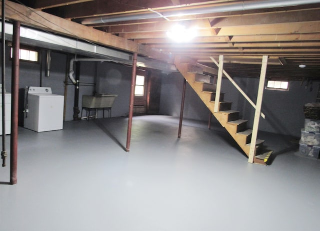 798 Hanover St, Manchester, NH 03104 - basement featuring washer / dryer, stairs, and healthy amount of natural light