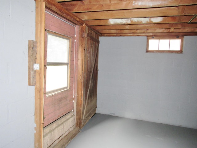798 Hanover St, Manchester, NH 03104 - below grade area with healthy amount of natural light and concrete block wall