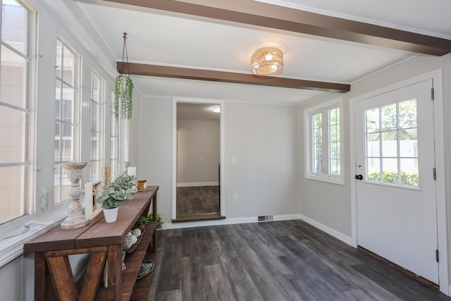 798 Hanover St, Manchester, NH 03104 - entryway with dark wood-type flooring and baseboards