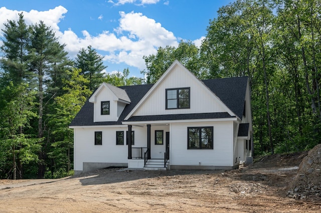 93 Stage Rd, Hampstead, NH 03841 - modern farmhouse style home featuring covered porch and roof with shingles