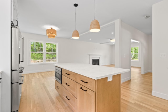 93 Stage Rd, Hampstead, NH 03841 - kitchen with appliances with stainless steel finishes, light wood finished floors, baseboards, and healthy amount of natural light