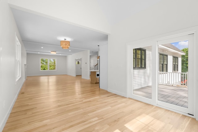 93 Stage Rd, Hampstead, NH 03841 - unfurnished living room with light wood-style floors and baseboards