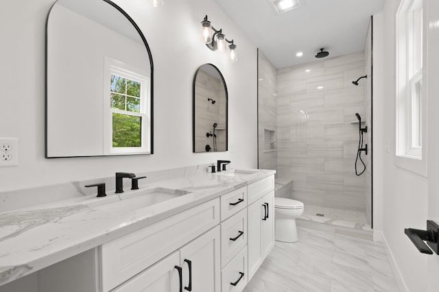 93 Stage Rd, Hampstead, NH 03841 - bathroom with double vanity, a tile shower, toilet, marble finish flooring, and recessed lighting