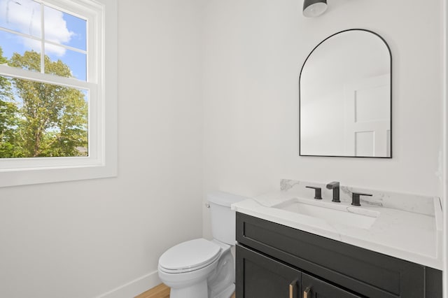 93 Stage Rd, Hampstead, NH 03841 - bathroom with vanity, toilet, and baseboards