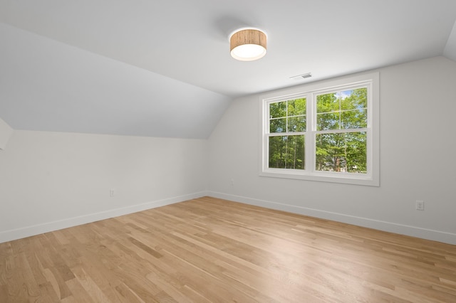 93 Stage Rd, Hampstead, NH 03841 - additional living space with vaulted ceiling, light wood finished floors, and baseboards