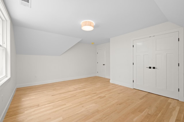 93 Stage Rd, Hampstead, NH 03841 - additional living space featuring light wood-style flooring, lofted ceiling, and baseboards