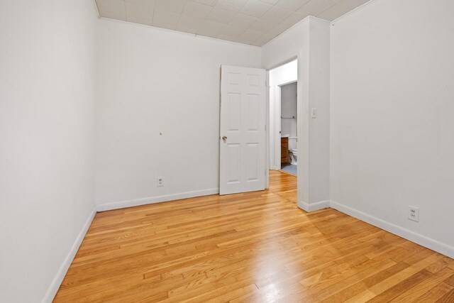 5 Dogford Rd, Hanover, NH 03750 - spare room featuring crown molding, light wood-style floors, and baseboards