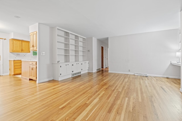 5 Dogford Rd, Hanover, NH 03750 - unfurnished living room featuring light wood-type flooring and baseboards