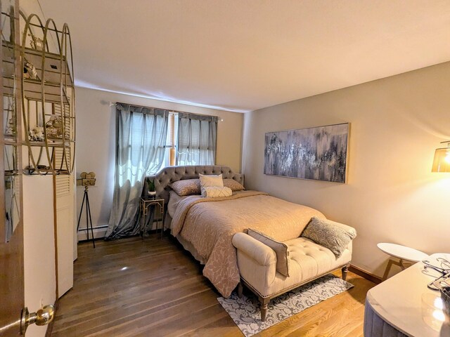 19 Bradford Dr, Salem, NH 03079 - bedroom with baseboard heating and wood finished floors