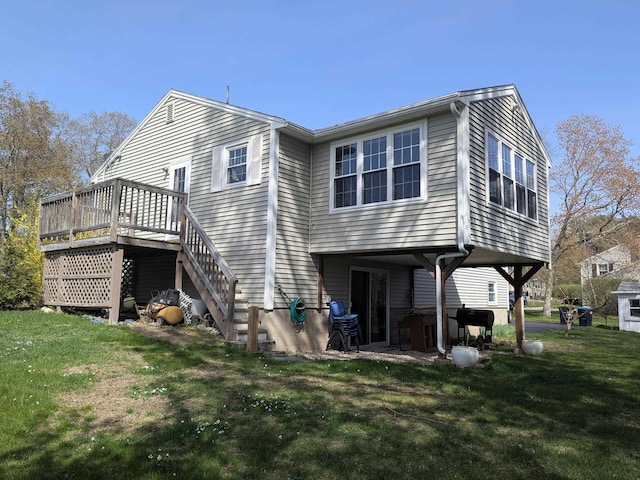 19 Bradford Dr, Salem, NH 03079 - back of property with a yard, a wooden deck, and stairway